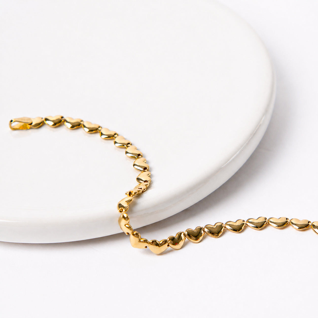PULSERA CORAZONES ORO AMARILLO 14K
