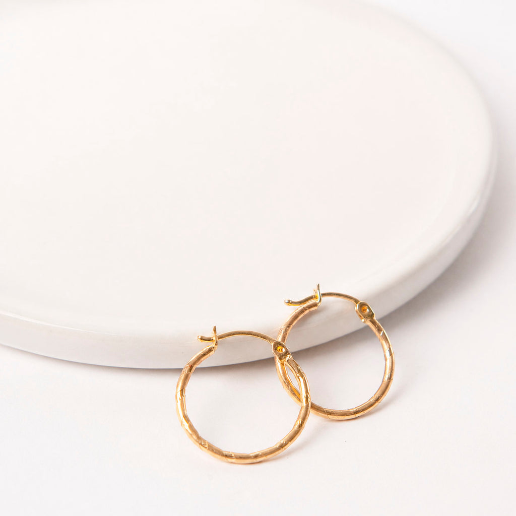 ARRACADAS CHICAS EN ORO AMARILLO 14K
