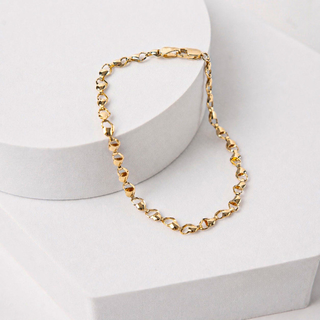 PULSERA MITAD CORAZONES ORO AMARILLO 14K