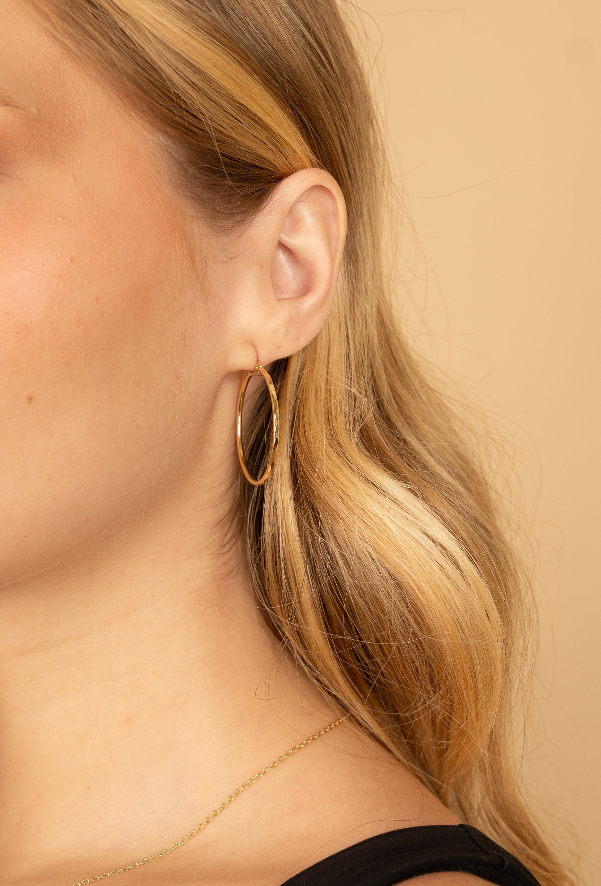 ARRACADAS GRANDES FACETADAS EN ORO AMARILLO 14K
