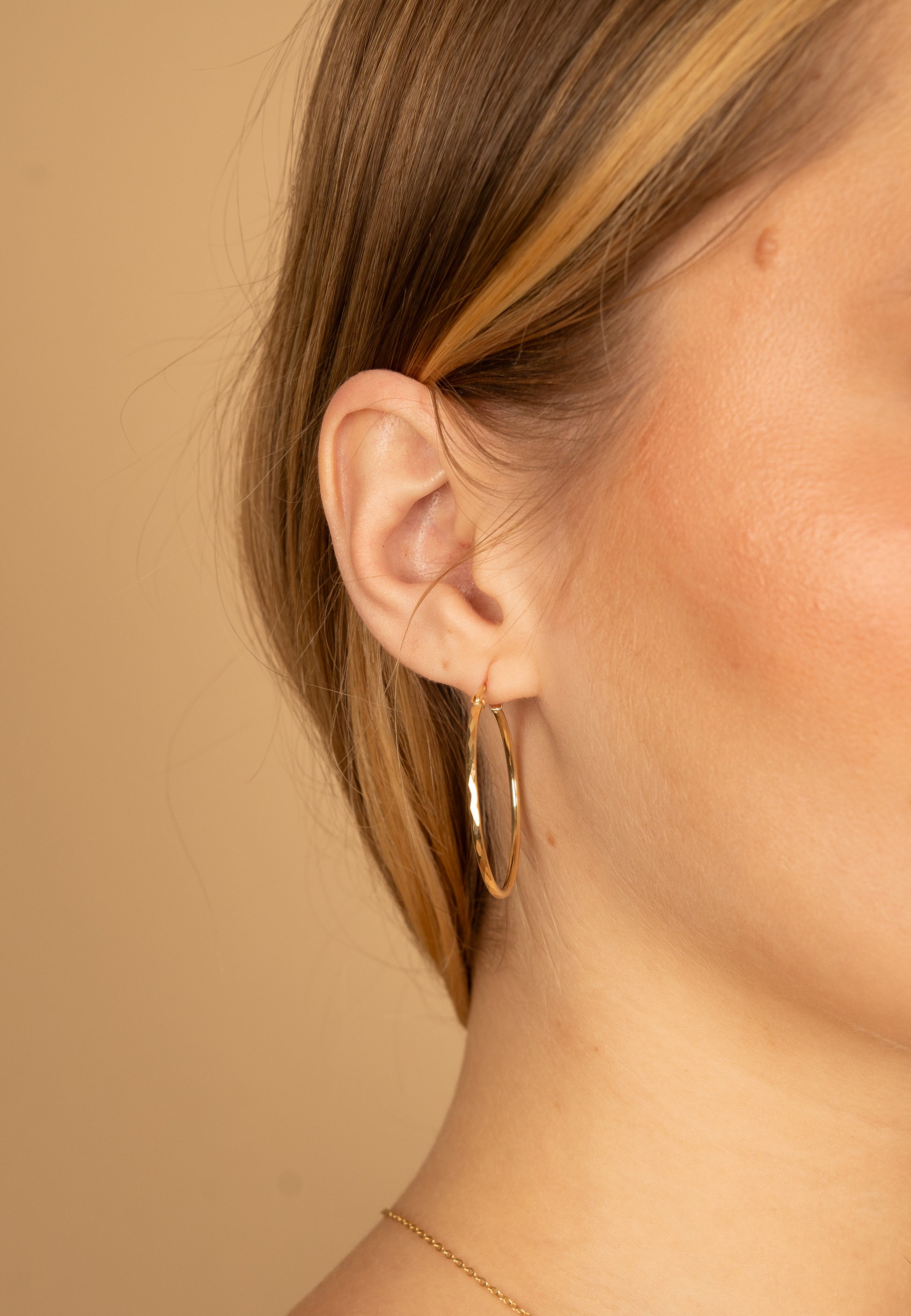 ARRACADAS GRANDES FACETADAS EN ORO AMARILLO 14K