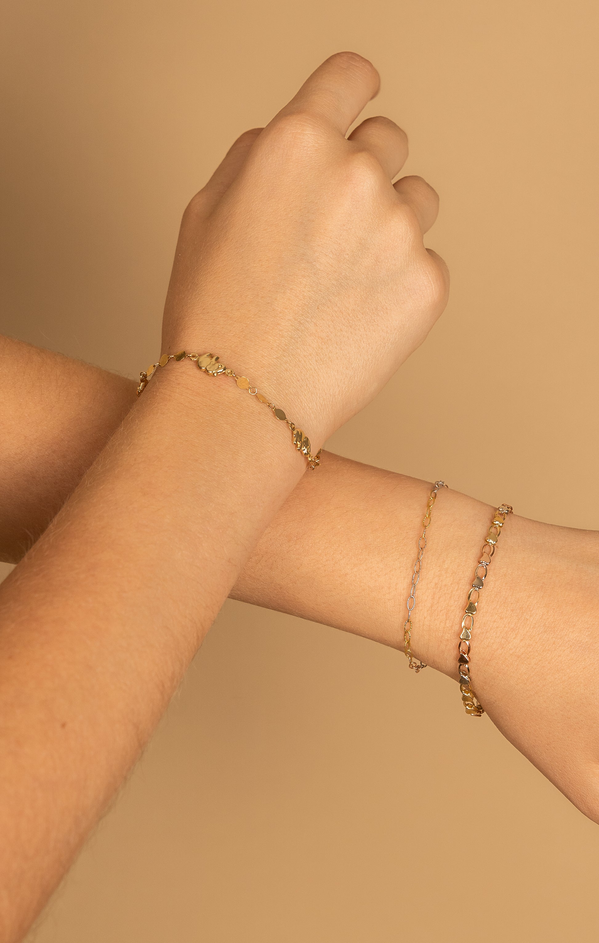 PULSERA MITAD CORAZONES ORO AMARILLO 14K