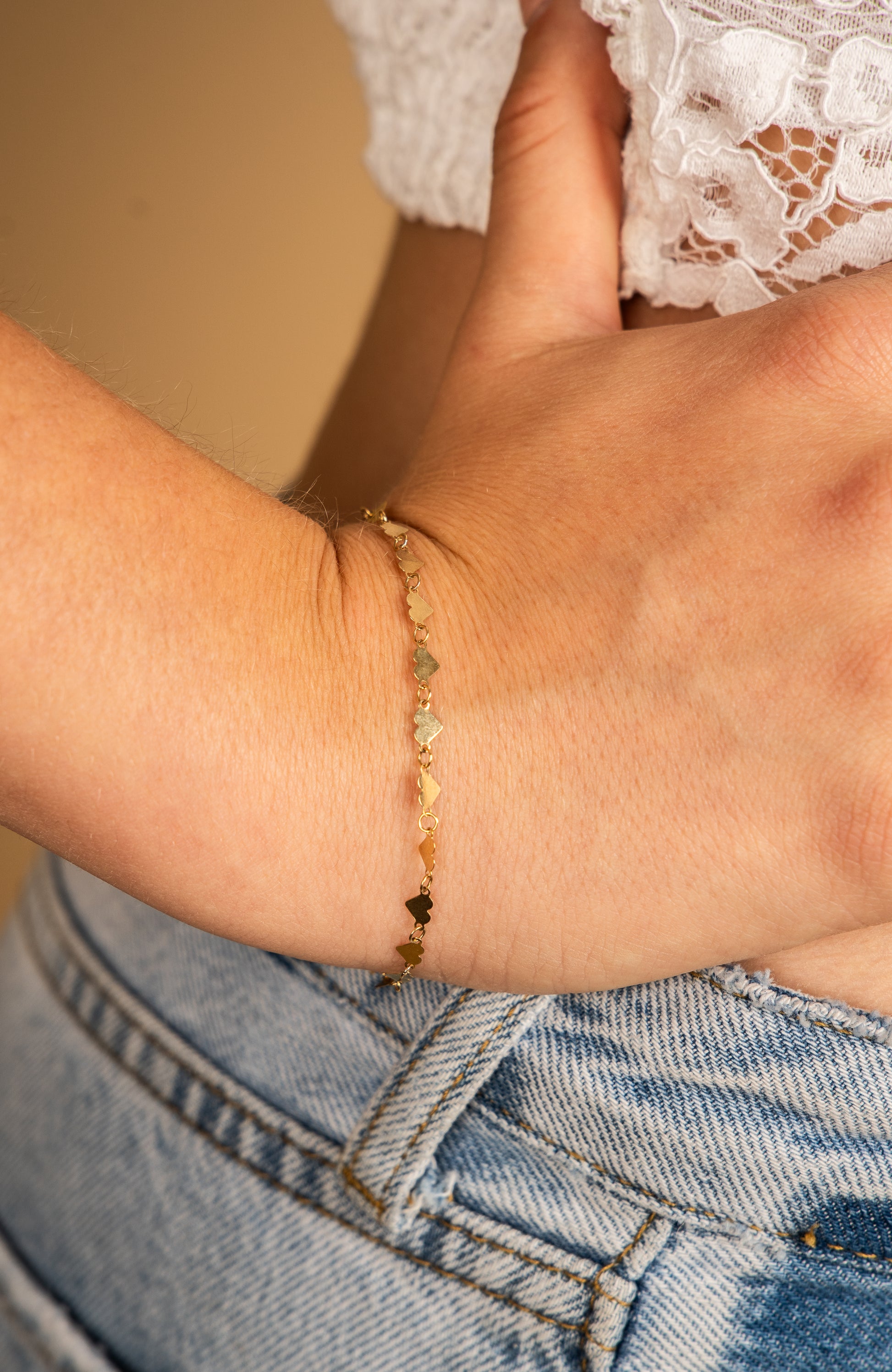 PULSERA CORAZONES EN ORO AMARILLO 14K