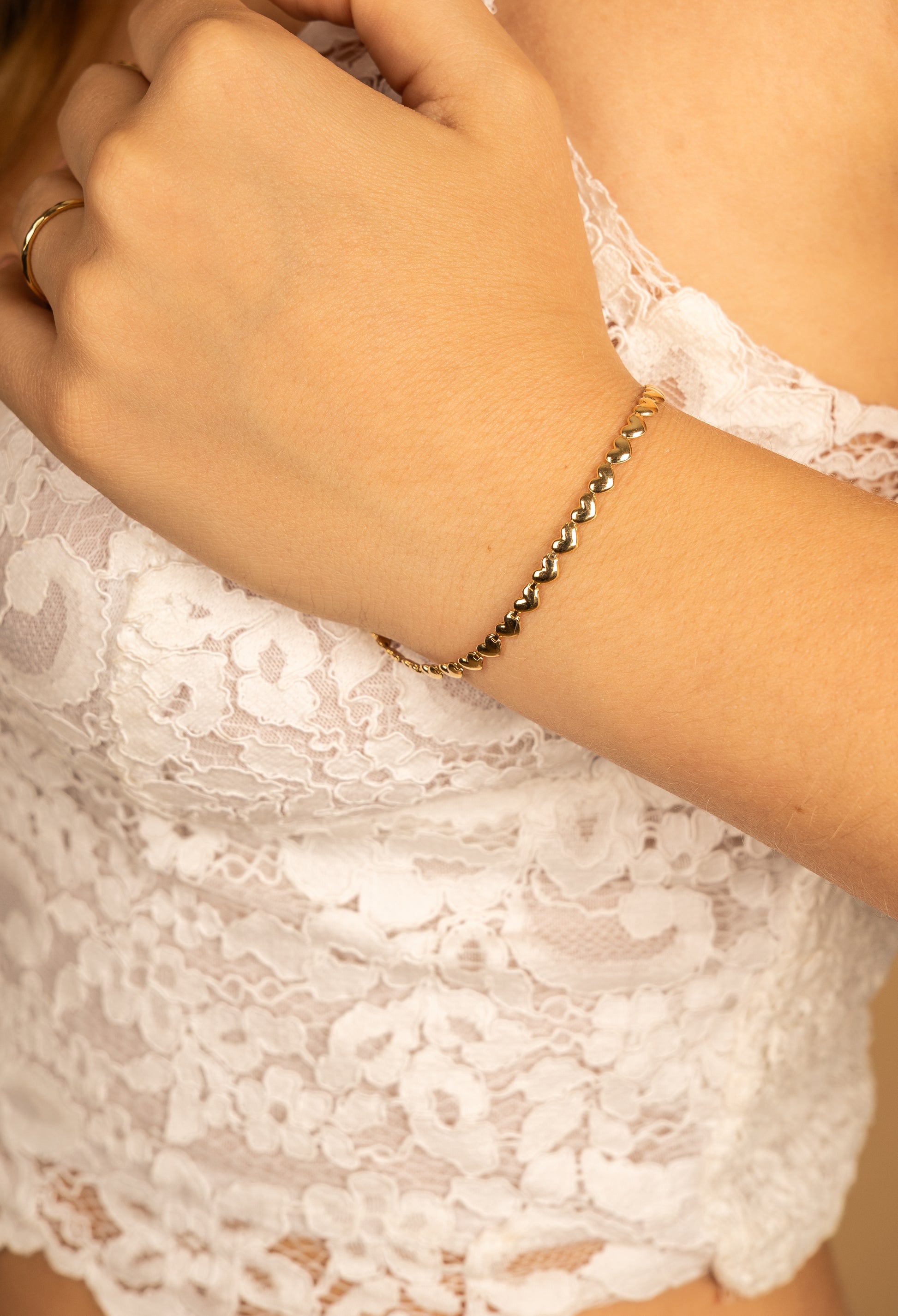 PULSERA CORAZONES ORO AMARILLO 14K